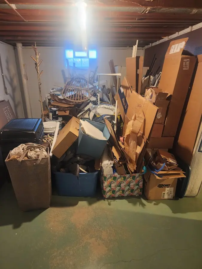 Roll-off dumpster container at job site for 20 Yard Dumpster Rental in Wayland